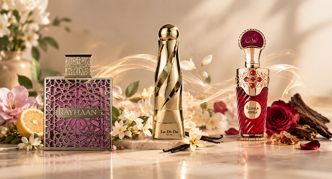 Luxury perfume layering scene featuring Rayhaan Kiss, Arabiyat Prestige La-Di-Da, and Nusuk Johra fragrances with floral, citrus, vanilla, and oud elements.
